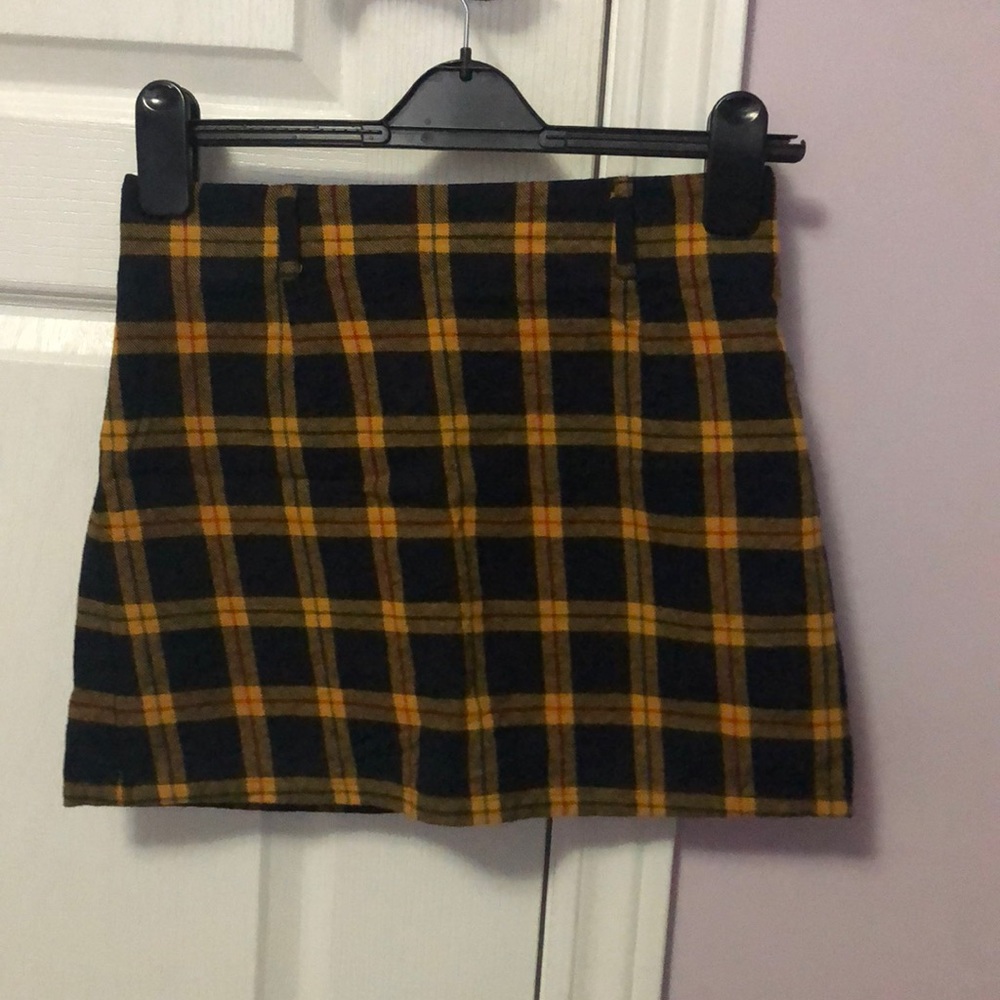 Yellow, navy blue, and red plaid skirt